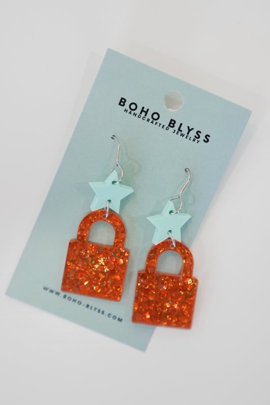 It’s Showbiz earrings